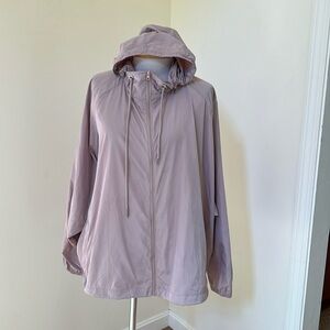Soia & Kyo 1X light mauve lightweight rain jacket with hood.